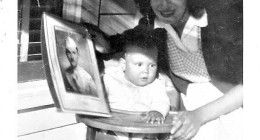 Lt. Scherer's wife Santina with son Bill  holding photo of Lt. Scherer