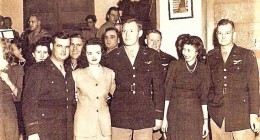 Maj. Fensler (C.) and 2nd Lt. Harvey M. Nix (behind Fensler's R. shoulder)