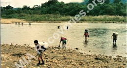 Porters at river crossing in northern Burma