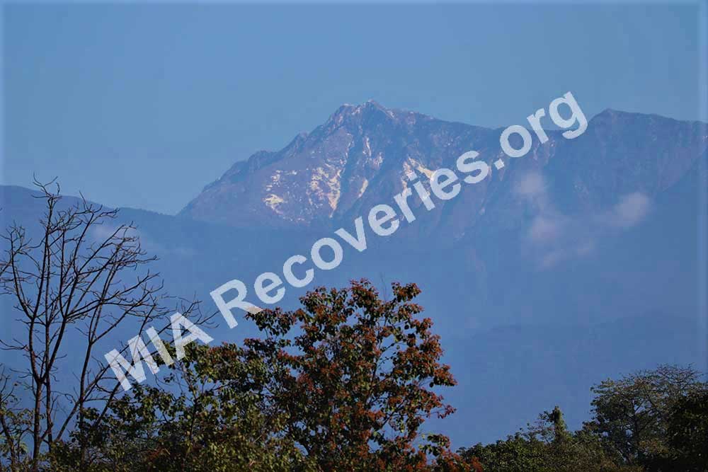 Crash site in valley at base of Siirundi Mtn.