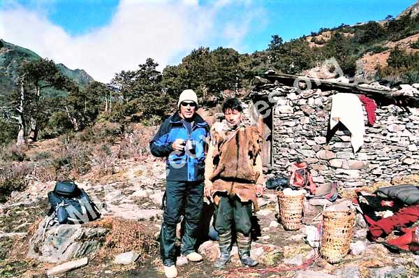 17-Clayton and Tibetan guide at yak herder's hut near crash site
