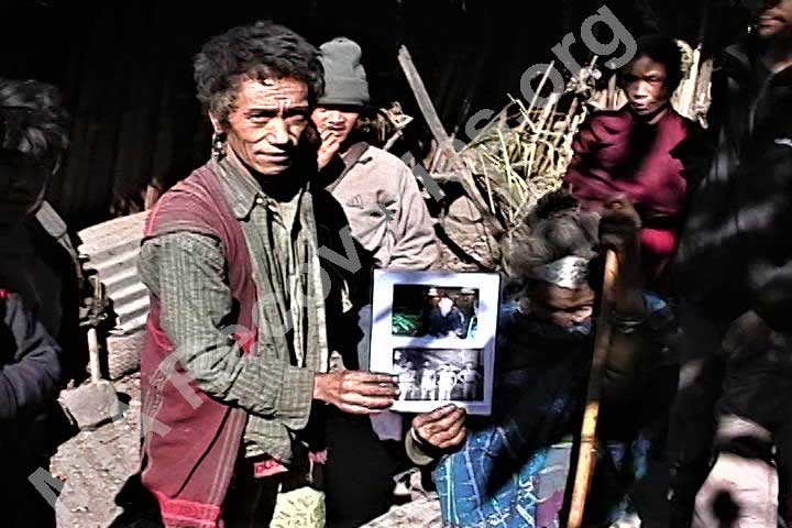 Mishmi woman (seated behind photo) who cared for Rosbert and Hammell in 1943