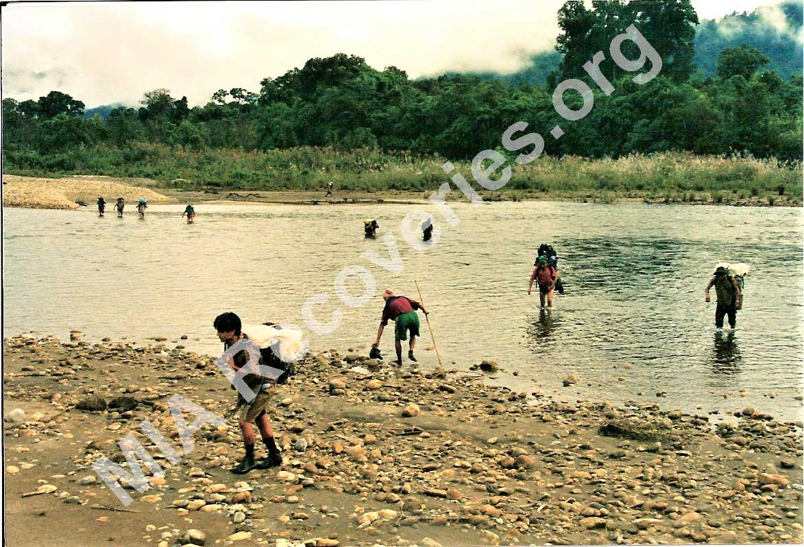 Porters at river crossing in northern Burma