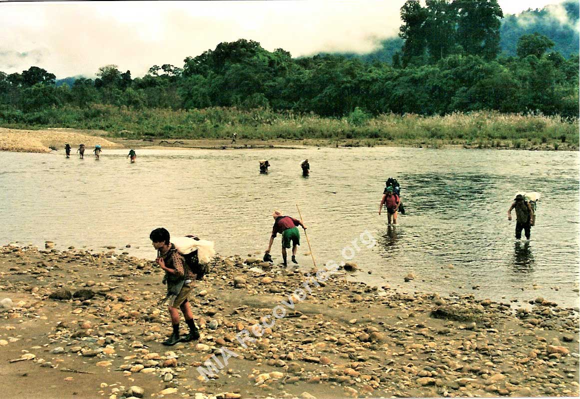 Porters at river crossing in northern Burma