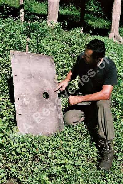 Clayton examining wreckage