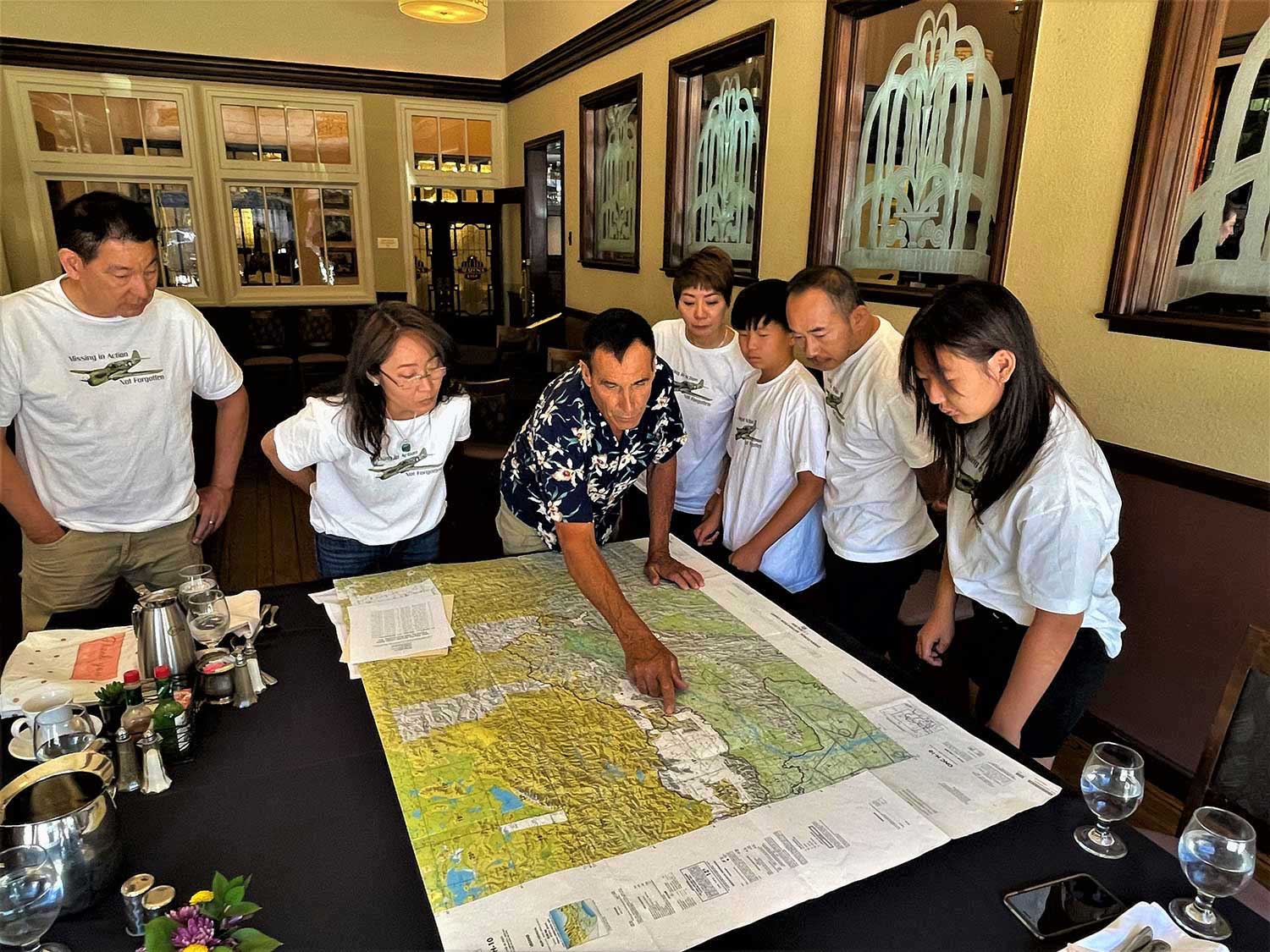 Clayton explained the Hump topo map, the air routes flown and the myriad of dangers facing the Hump aircrews.