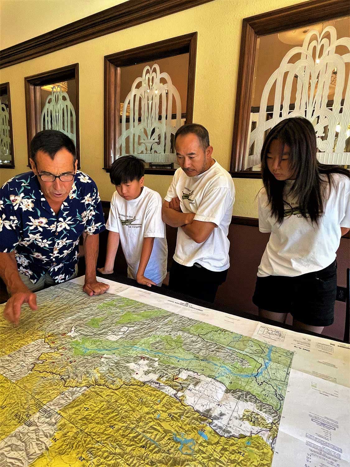 Clayton explained the Hump topo map, the air routes flown and the myriad of dangers facing the Hump aircrews.