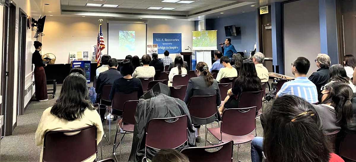 Clayton speaking at fundraising event